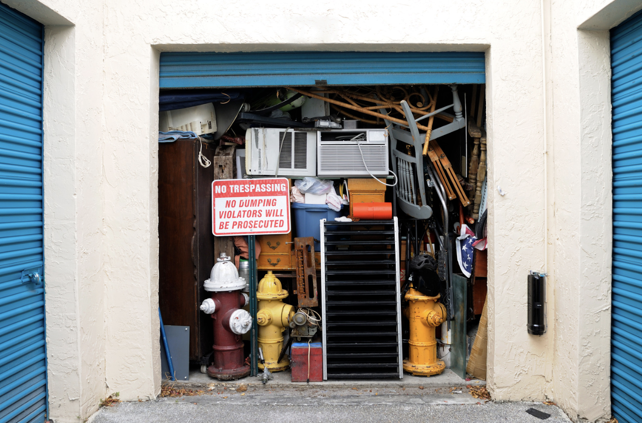 A storage unit filled with abandoned household items